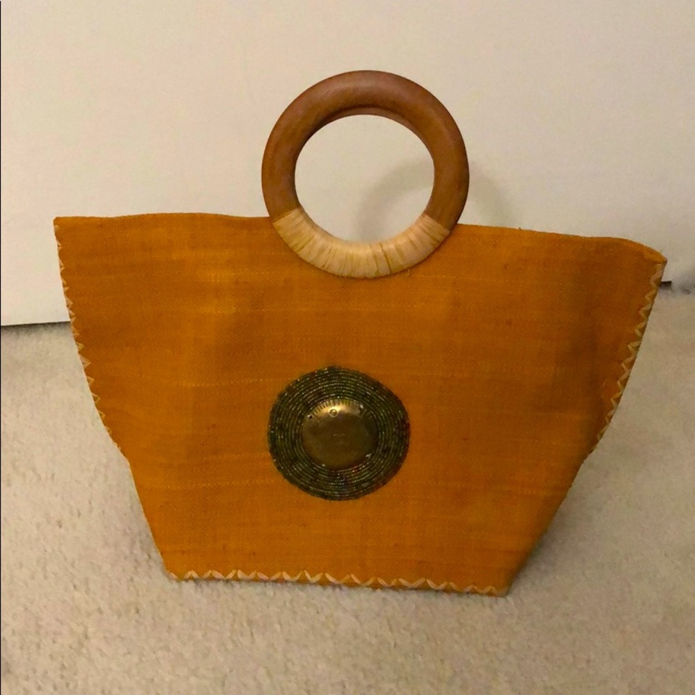 Structured handmade cloth handbag with gold trim